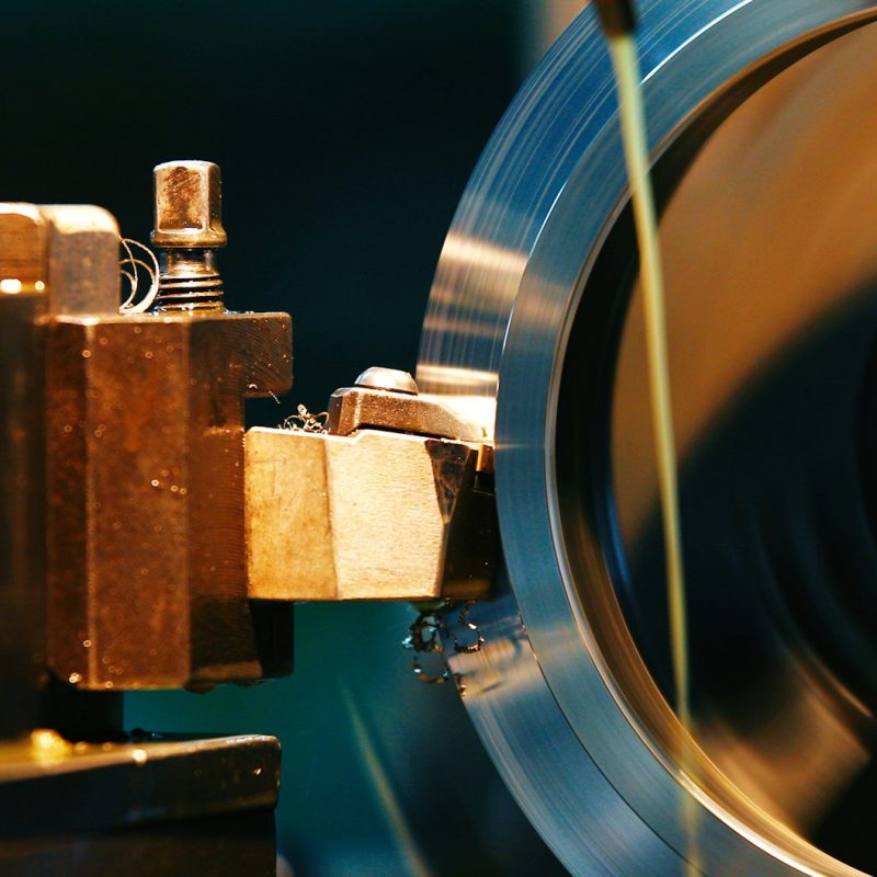 Finishing metal working on high precision grinding machine in workshop